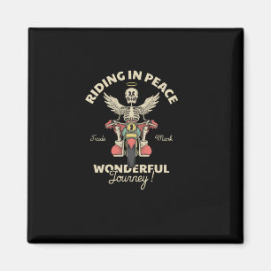 cartoon emblem of skull angel riding motorcycle magnet