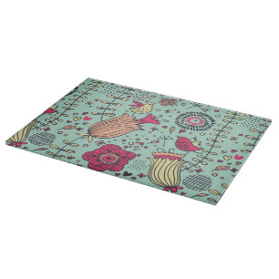 Cartoon floral pattern with birds cutting board