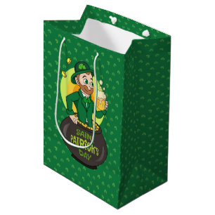 Cartoon leprechaun in a pot of gold holding a pint medium gift bag