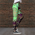 Cartoon Mandala Flower Green Purple and Black Leggings<br><div class="desc">This funky mandala flower design features green,  purple,  and black in a cartoon style. Trippy geometric visuals for the modern hippie or lover of vibrant colours!</div>