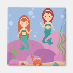 Cartoon mermaid sisters swim in the ocean magnet