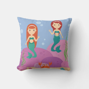 Cartoon mermaid sisters swimming in the ocean cushion