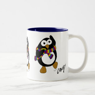 Cartoon penguin wearing a colourful rainbow scarf. Two-Tone coffee mug