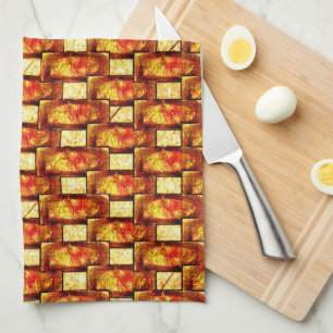 Carved and stained orange brown plates tea towel