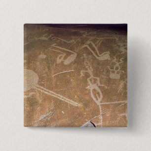 Carved petroglyph depicting figures 15 cm square badge