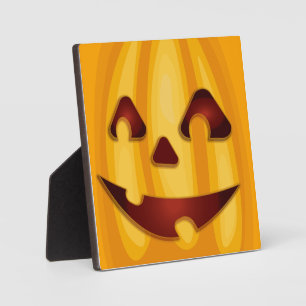 Carved pumpkin smiling Halloween design Plaque