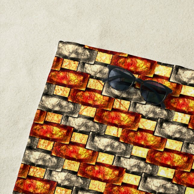 Carved rectangular pieces lined in red and beige beach towel (In Situ)