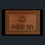 Carved Wood Chag Sameach Magnet<br><div class="desc">Suitable for Chanukkah or other Jewish holidays. Features a computer-generated "old wood carving" of a Magen David (Star of David),  text reading "Chag Sameach" and a floral border.</div>