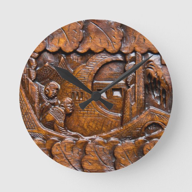 Carved wooden oriental look round clock (Front)