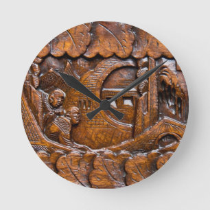 Carved wooden oriental look round clock