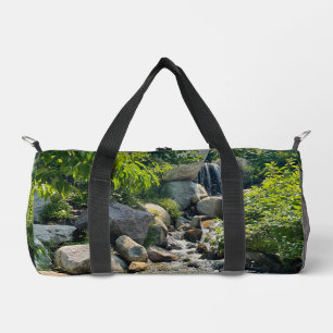 Cascading forest waterfall forest greenery duffle bag