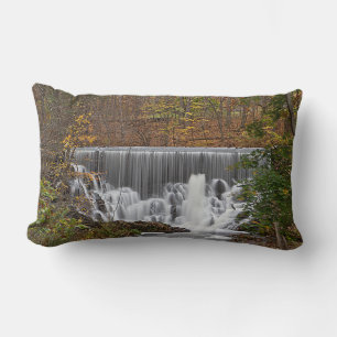 Cascading woodland waterfall and fall foliage lumbar cushion