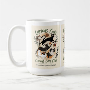 cat and a warm cup in hand