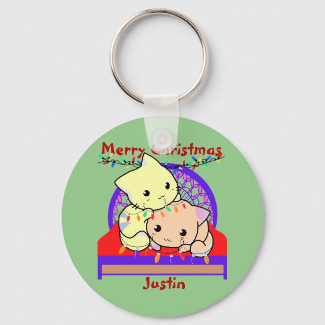 Cat christmas on bed, personalised name key ring (Front)