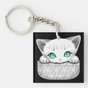 Cat Cute and Playful peaking from a Pocket Key Ring