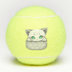 Cat Cute and Playful peaking from a Pocket Tennis Balls