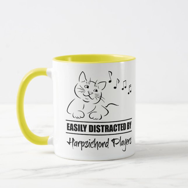 Cat Easily Distracted by Harpsichord Players Mug (Left)