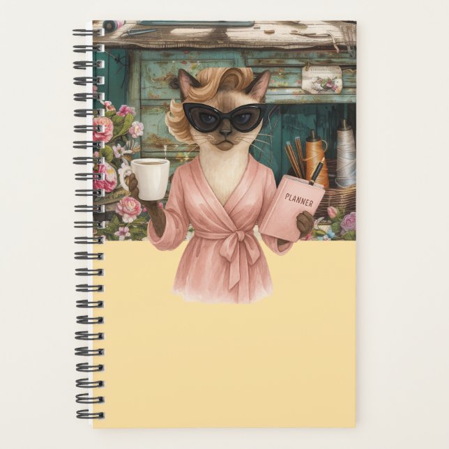 Cat female is holding daily planner  (Front)