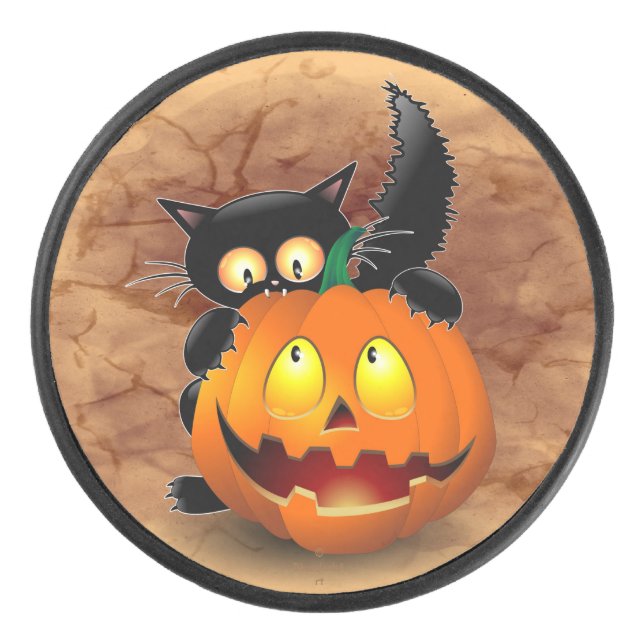 Cat Fun Halloween Character biting a Pumpkin Hockey Puck (Front)