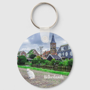 Cat in traditional fishing village key ring