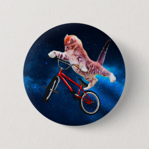 Cat jump on a bike 6 cm round badge