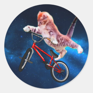 Cat jump on a bike classic round sticker