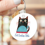 Cat Ladies Vote Script Rustic Bold Cute Patriotic Key Ring<br><div class="desc">“Cat ladies vote”. Stand proud and share your support for Kamala Harris with this cute, fun, graphic, patriotic keychain. A cute rustic country cat illustration in black, red, white and turquoise blue and navy blue handwritten script typography overlay a white background. Choose from small and large sizes, as well as...</div>