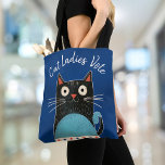 Cat Ladies Vote Script Rustic Feminist Cute Bold Tote Bag<br><div class="desc">“Cat ladies vote”. Stand proud and share your support for Kamala Harris whenever you go shopping with this cute, fun, graphic, feminist tote bag. A cute rustic country cat illustration in black, red, white and turquoise blue and white handwritten script typography overlay a navy blue background. Prove Vance wrong, proudly...</div>