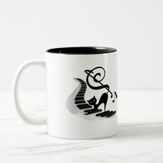 Cat on a Piano keyboard playing music coffee mug (Left)