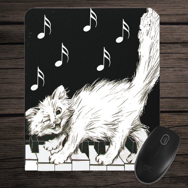 Cat on the Piano Keys Mouse Pad (Winking white cat on piano keys white music notes on black mousepad.)