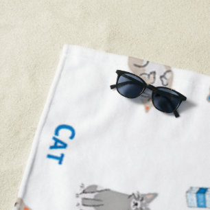Cat pattern on white beach towel