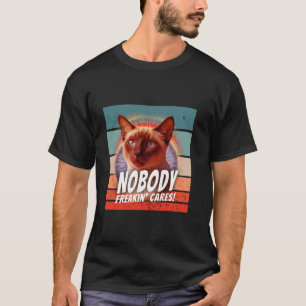 Cat piercing gaze attitude face intense humourous  T-Shirt