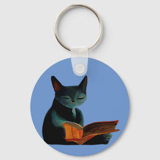 Cat reading a book key ring