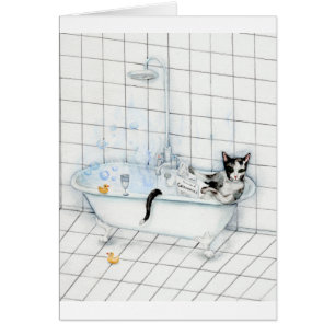 Cat reading newspaper in the bathtub