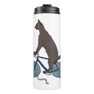 cat riding bike with yarn ball wheels thermal tumbler