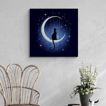 Cat silhouette swinging from the crescent moon
