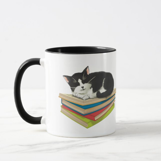 Cat sleeping on books mug (Left)