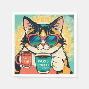 Cat wearing oversized sunglasses, holding a coffee napkin