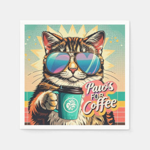 Cat wearing oversized sunglasses with coffee napkin