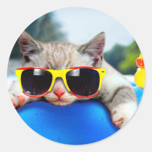 Cat wearing sunglasses relaxing on air mattress classic round sticker