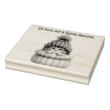 Cat wooden insert with wool hat.