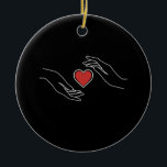 Catching Heart Ceramic Ornament<br><div class="desc">Capture the essence of love and connection. 'Catching Heart' symbolises the beauty of moments that steal your heart away.</div>