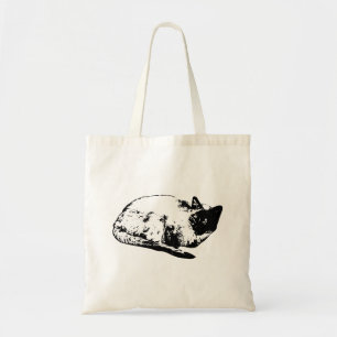 Catnap under winter lights tote bag