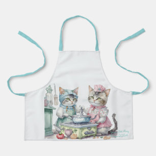Cats at kitchen apron