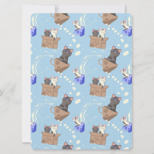 Cats in box and milk drops on blue