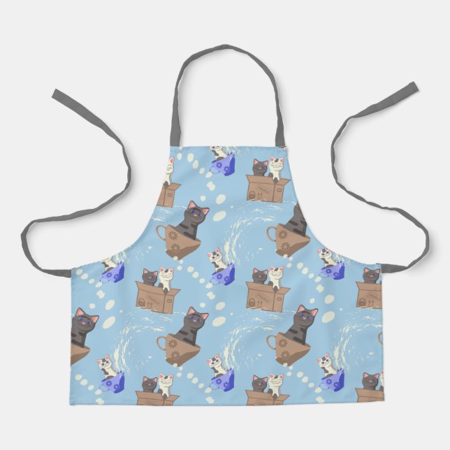 Cats in box and milk drops on blue apron (Front)