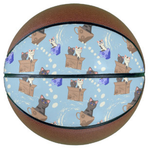 Cats in box and milk drops on blue basketball