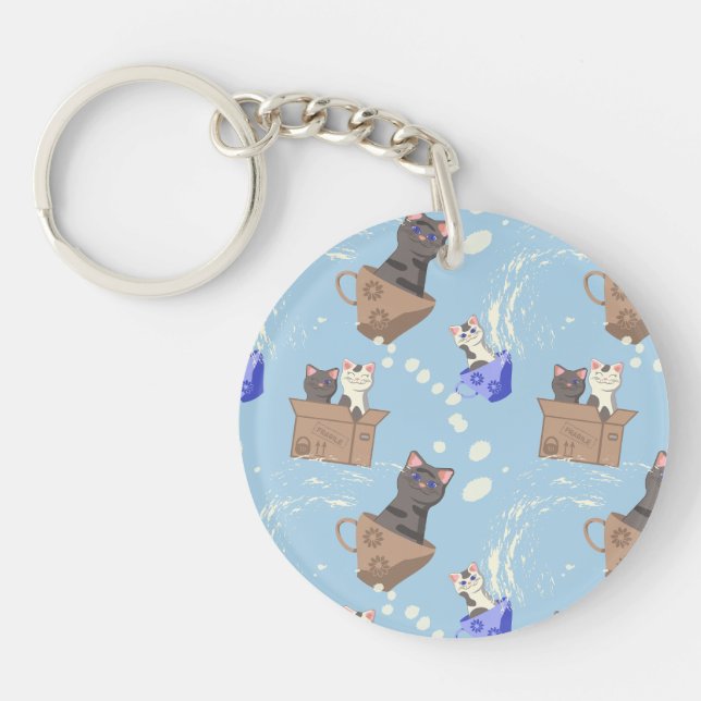 Cats in box and milk drops on blue key ring (Front)