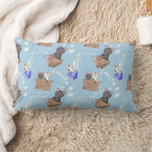 Cats in box and milk drops on blue lumbar cushion