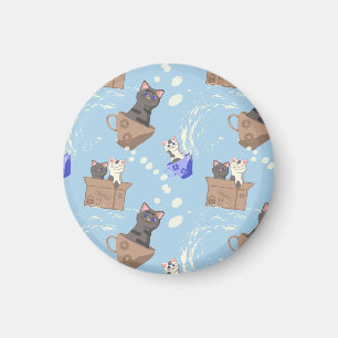 Cats in box and milk drops on blue magnet